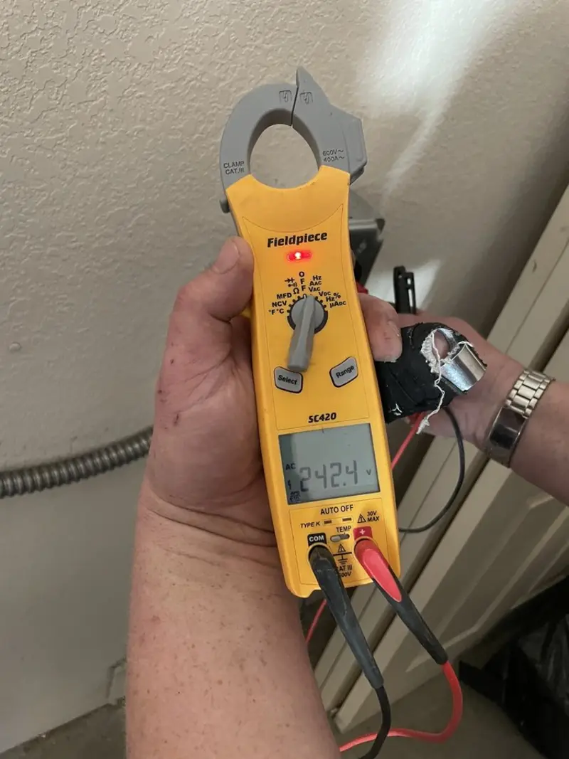 Voltage testing with clamp meter during Ceiling Fan Installation in CaÃÂ±on City